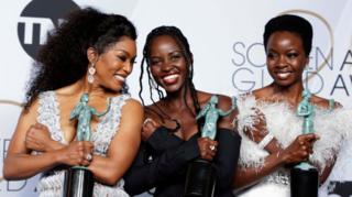 Angela Bassett, Lupita Nyong'o and Danai Gurira pose backstage