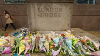Flowers left on London Bridge for the victims of the terrorist attack in which eight people were killed. PRESS ASSOCIATION Photo. Issue date: Sunday June 3, 2018. London"s resolve against terrorism has never been stronger, Theresa May has said, ahead of a national minute"s silence to commemorate the victims of the London Bridge attack