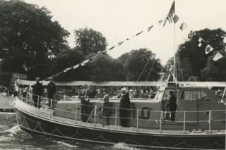 The Queen aboard a lifeboat