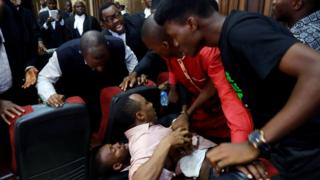 Fighting breaks out as security personnel attempt to re-arrest Nigerian activist Omoyele Sowore