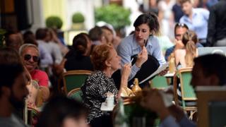 Waitress at table