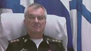 Still from footage shows video link with Adm Sokolov