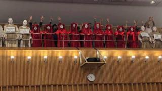 Extinction Rebellion protesters in council chamber gallery. Pic: Rob Nolan
