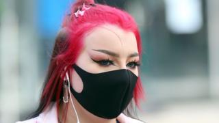 Belfast shopper wearing face mask