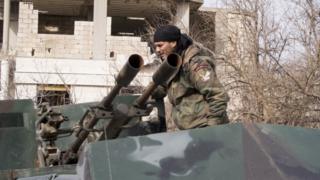 Syrian army soldier in the recently recaptured village of Salma, 22 January 2016