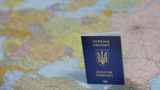 Паспорт України на тлі карти Європи