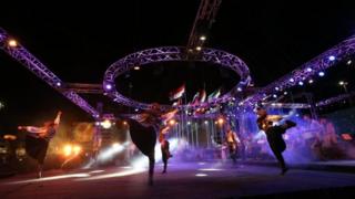 Dancers perform at the opening of the trade fair on Thursday