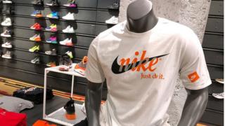 nike swoosh on a t-shirt and shirts