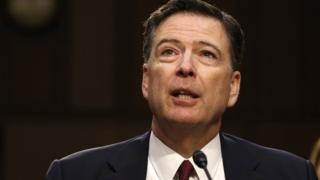 Former FBI Director James Comey testifies before a Senate Intelligence Committee
