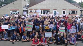 school children take part in march for safer roads