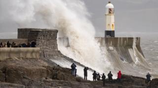 Waves crash against the harbour wall on January 21, 2024 in Porthcawl, Wales