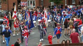 Crowds in Belfast's donegall road watch 12th parade