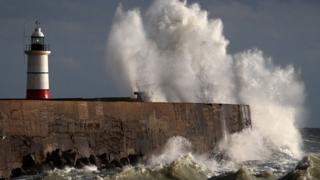 Massive waves crash against the harbour wall, as Storm Angus hits Newhaven in East Sussex over the weekend