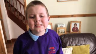 Deaf child with autism left on Powys school bus probe - BBC News