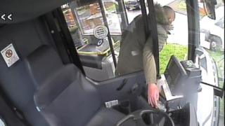 CCTV of man stealing bus takings