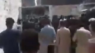 A video purporting to show the mob in Pakistan. The BBC could not independently verify its veracity