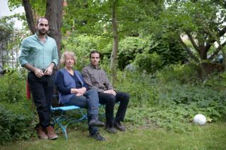 Hilde Schramm and her Syrian lodgers, Nizar and Ahmad