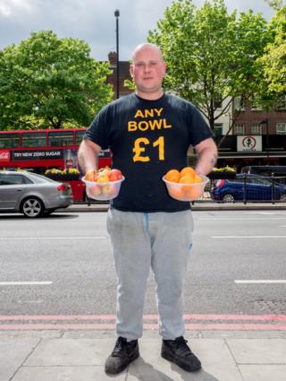 Mark, 32, from Essex selling fruit and vegetables. Holloway, London.