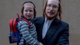Hasidic father and toddler in Canvey