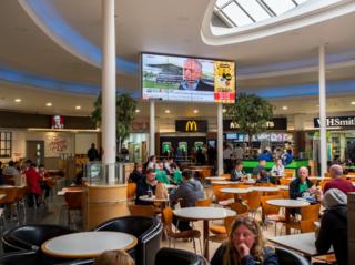 Labour leader, Jeremy Corbyn, speak to Sky News on a television screen at an Extra Motorway Services. Haddon, Cambridgeshire.