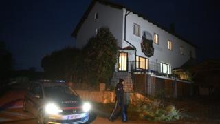 Police at Austrian house where six bodies were found, 1 Dec 16