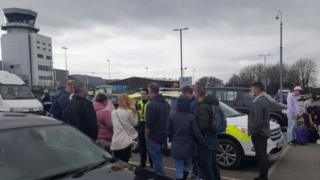 Valet parking customers talking to police