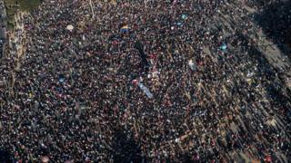 in_pictures An aerial view of people demonstrating against the government of Chilean President Sebastian Pinera, in Santiago on 12 November, 2019.