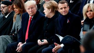 El rey de Marruecos Mohammed VI, Melania Trump, Angela Merkel, Emmanuel Macron y su esposa Brigitte.