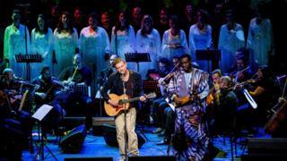 Damon Albarn performs with The Orchestra of Syrian Musicians