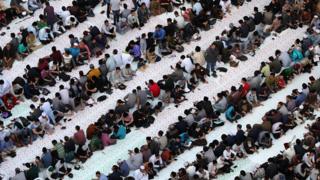 A large number of people sitting inside a mosque waiting to break the fast - Sunday 12 May