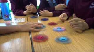 Fidget spinners in classroom