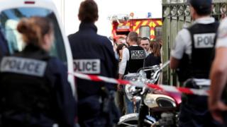 Police work near the scene where French soldiers were hit and injured by a vehicle in the western Paris suburb of Levallois-Perret, France, 9 August 2017