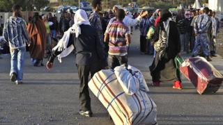 'Yan Habasha kenan a lokacin da suka sauka a filin jirgin saman Bole da ke birnin Addis Ababa a ranar 10 ga watan Disambar 2013