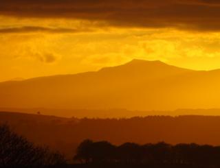 Sunset over hills