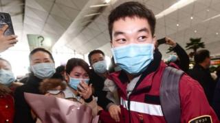 Shenyang bidding farewell with family members and friends before leaving for Wuhan