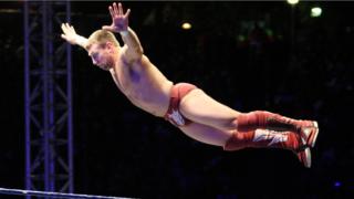 Wrestler in mid-air