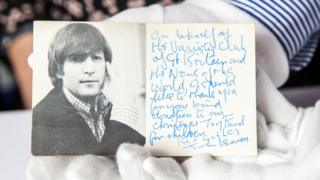 Unseen John Lennon images revealed at The Beatles Story - BBC News