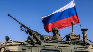 росія