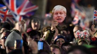 Brexit supporters wave Union flags in Westminster