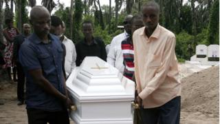 Pall-bearers carry the coffin of Welly Nzitonda, the son of human rights defender Pierre-Claver Mbonimpa, during a funeral ceremony in Bujumbura, Burundi (10 November 2015)