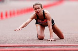 Great Britain's Hayley Carruthers falls at the end of the women's elite race