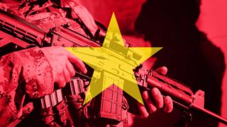 Soldado y bandera de Vietnam