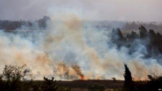 A fire near Kfar Sold, north of Israel, caused by four missiles fired from the Syrian side of the Israeli-Syrian border hitting open areas in the Golan Heights and Galilee, on 20 August 2015.