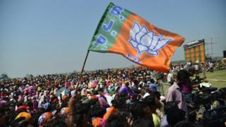 Bharatiya Janata Party (BJP) supporters listen to the Indian Prime Minister Narendra Modi (unseen) as he addresses an election campaign rally ahead of the second phase of Assam Assembly election in Nagaon district of Assam, India, 08 April 2016.