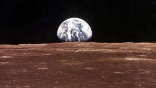 Planet Earth also appears on the surface of the moon