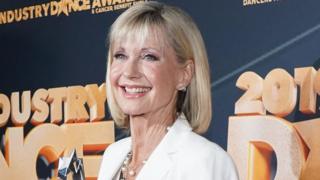 The Sun dubbed the Grease star "Olivia Newton Gong"