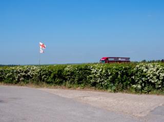 The flag of Saint George flies next to the A1. Nottinghamshire.
