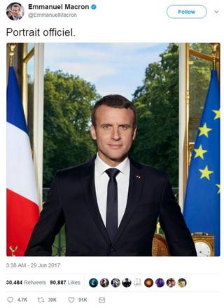 The French president tweeted his official portrait in which he stands in front of his desk, a window open onto a garden behind him. He is flanked by the French flag on the left, and the European Union flag on the right.