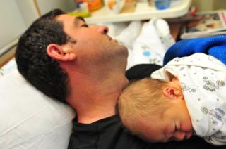 dad falls asleep with baby