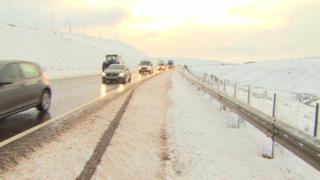 Cars driving on icy roads